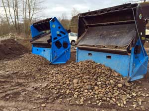 Portable Topsoil Screener Loaded with SkidSteer